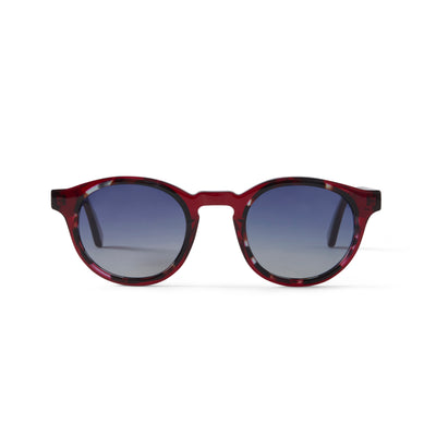 Photo of a pair of Alexis Sun Clear Burgundy & Blue Marble Sun Glasses by FrenchKiwis