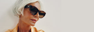 White Hair Mature Women Wearing Readers Sunglasses Designed In Canada